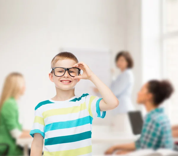 Sorridente bambino in occhiali da vista — Foto Stock