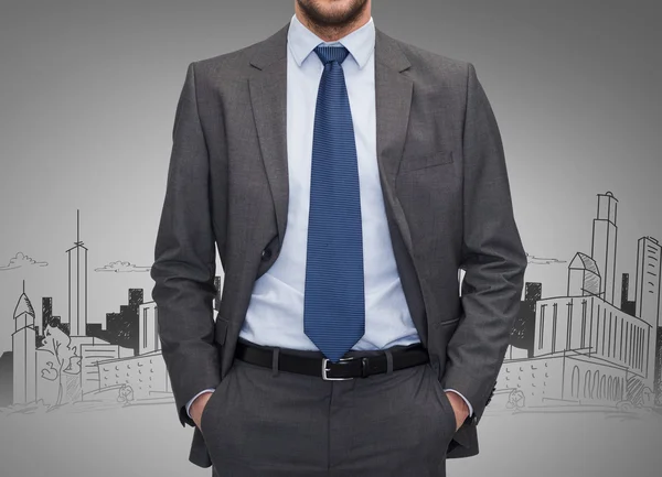 Close up of businessman over gray background — Stock Photo, Image