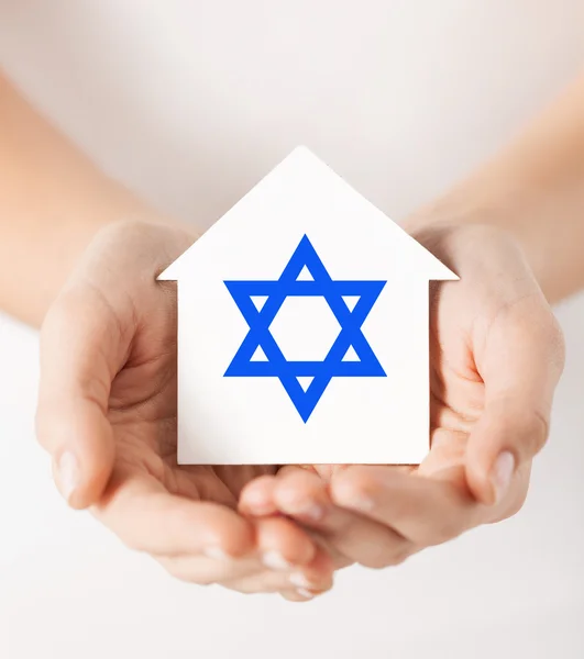 Hands holding house with star of david — Stock Photo, Image