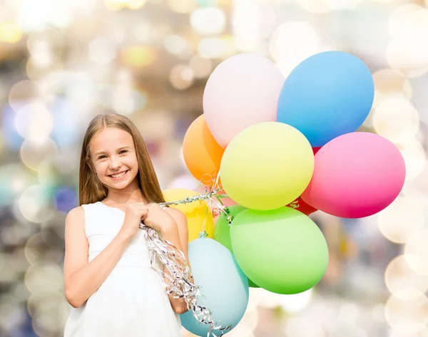 Boldog lány színes léggömbök — Stock Fotó