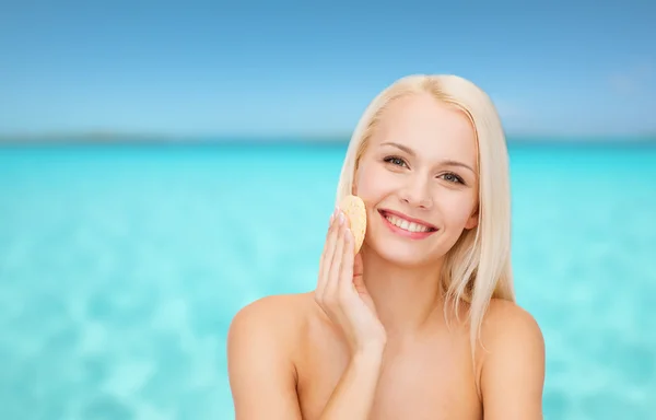 Beautiful woman with sponge — Stock Photo, Image