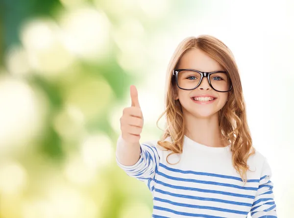 Little girl with black eyeglasses — Stock Photo, Image