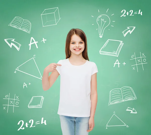 Smiling little girl in white blank t-shirt — Stock Photo, Image