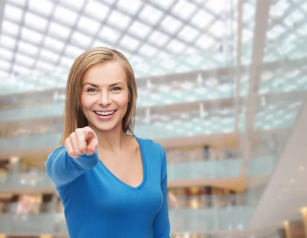 Smiling student pointing finger at you — Stock Photo, Image