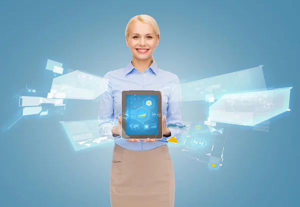 Businesswoman holding tablet pc with hologram — Stock Photo, Image
