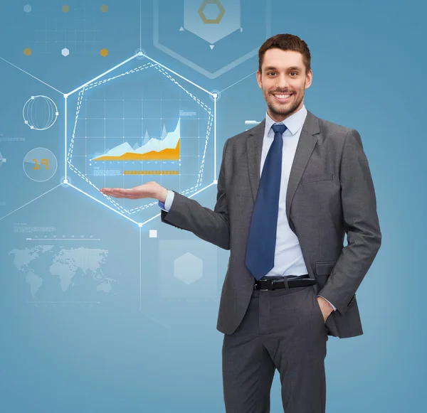 Businessman showing graph on virtual screen — Stock Photo, Image