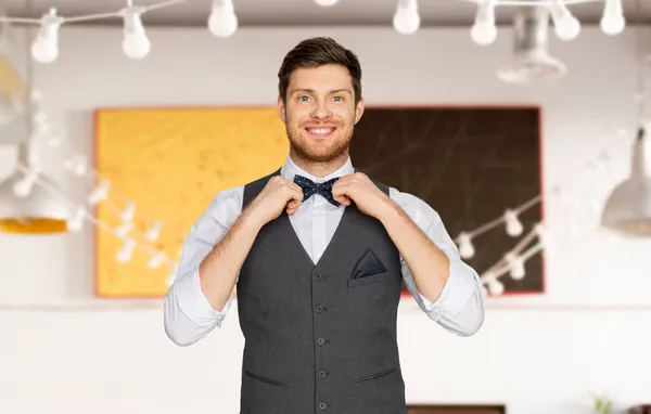 Happy man in festive suit dressing for party — Stock Photo, Image