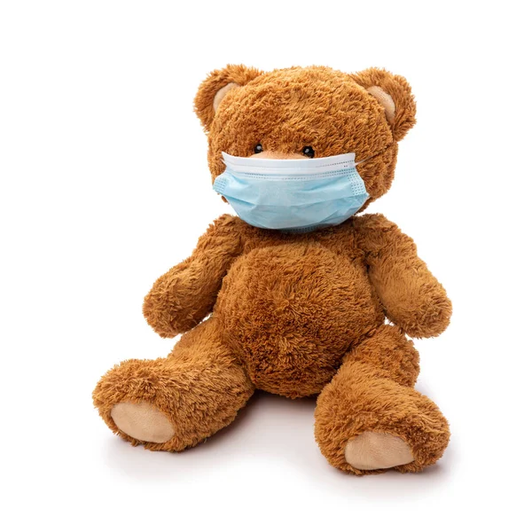 Juguete de oso de peluche en máscara médica protectora — Foto de Stock