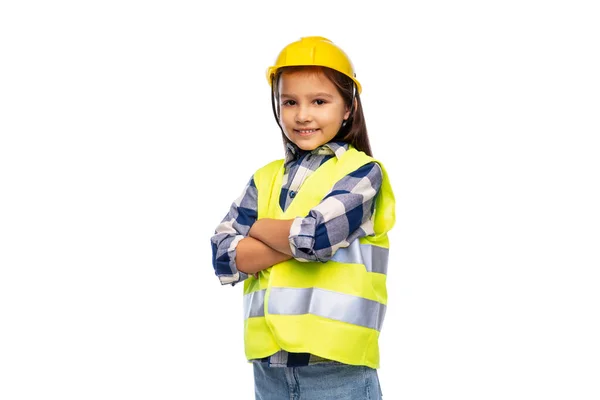 Sorrindo menina em capacete e colete de segurança — Fotografia de Stock