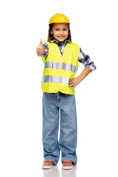 Girl in helmet and safety vest shows thumbs up — Stock Photo, Image