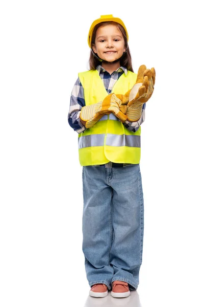 Kleines Mädchen mit Helm, Handschuhen und Warnweste — Stockfoto