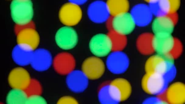 Close up of electric garland lights in dark room — Stock Video