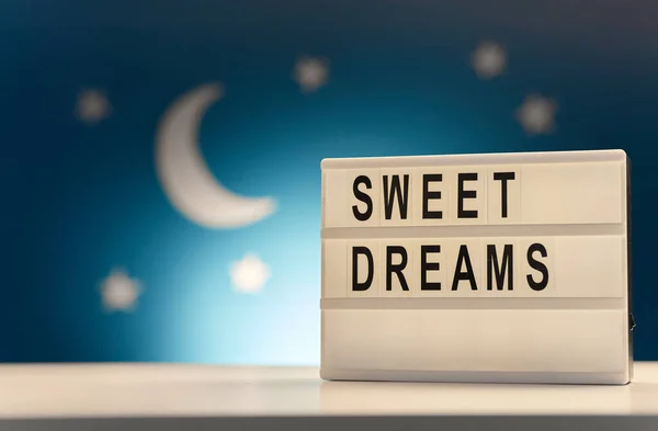 Light box with sweet dreams words at night — Zdjęcie stockowe