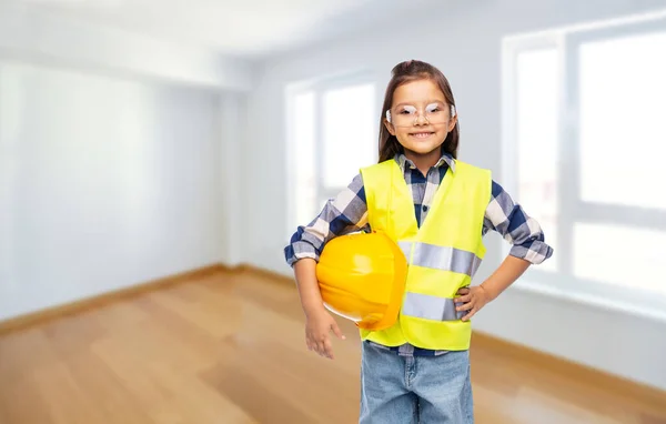 Happy girl with helmet in safety vest and goggles — Stock Photo, Image