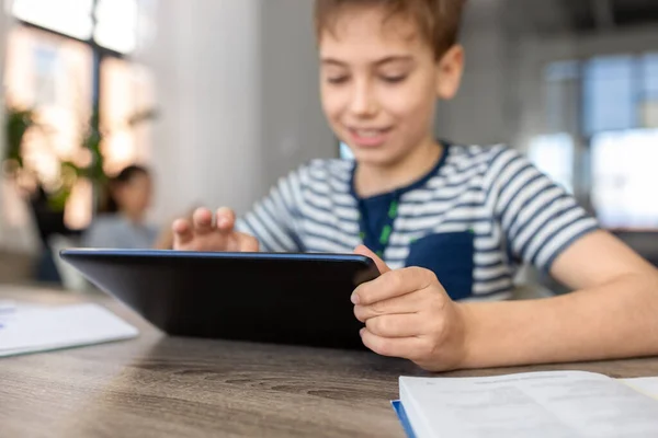 Student boy with tablet computer at home — Stok Foto