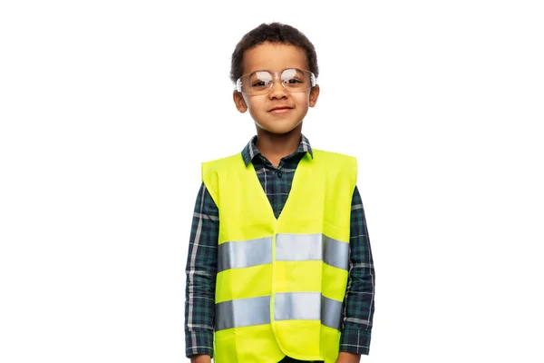 Little boy in goggles and safety vest — Stockfoto