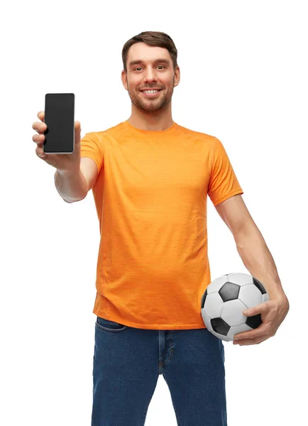 Male football fan with smartphone and soccer ball — Stock Photo, Image