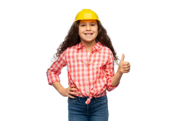 Sorrindo menina no capacete de construção — Fotografia de Stock