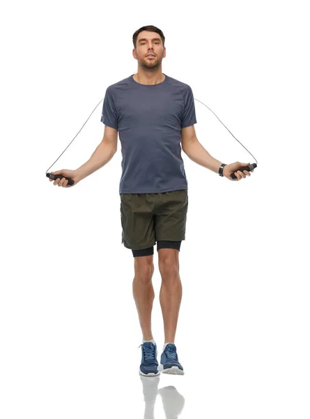 Man exercising with jump rope — Stock Photo, Image