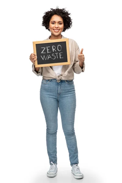 Woman with zero waste words on chalkboard — Stock Photo, Image