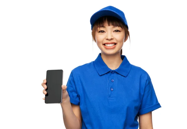 Happy delivery woman with smartphone — Stock Photo, Image