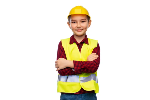 Niño pequeño con casco protector y chaleco de seguridad — Foto de Stock