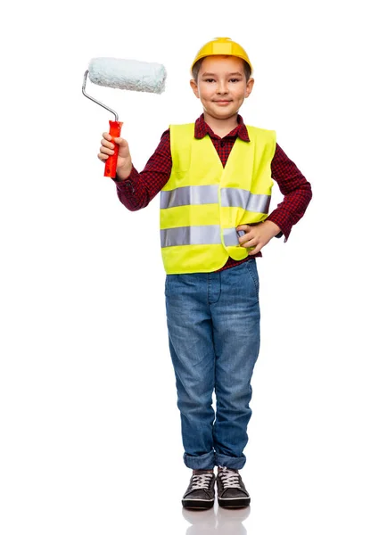 Menino em capacete de proteção com rolo de pintura — Fotografia de Stock