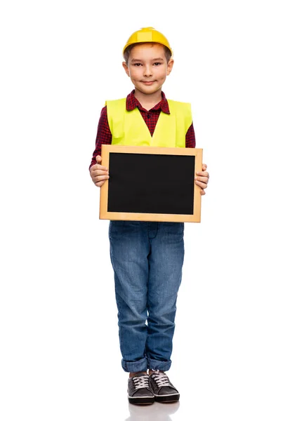 Menino em capacete protetor segurando quadro — Fotografia de Stock