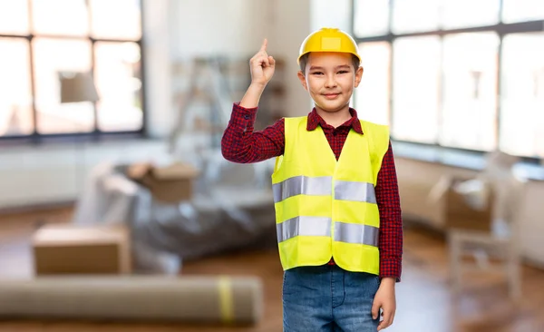 Little boy in protective helmet pointing finger up — Stock Photo, Image