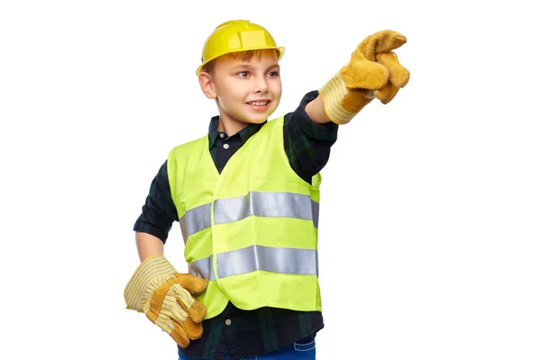 Niño con casco protector, guantes y chaleco de seguridad — Foto de Stock