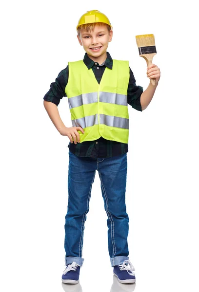 Niño pequeño en casco protector con cepillo — Foto de Stock