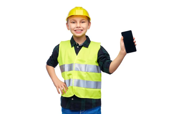 Niño pequeño con casco y chaleco de seguridad con teléfono — Foto de Stock