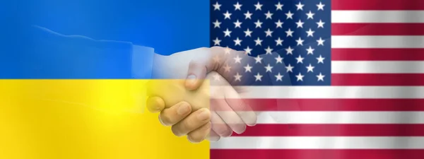 Рукопожатие над флагами Украины и США — стоковое фото