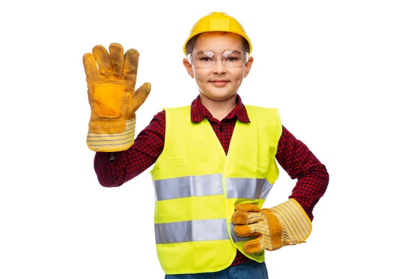 Αγόρι με προστατευτικό κράνος, γάντια και γιλέκο ασφαλείας — Φωτογραφία Αρχείου