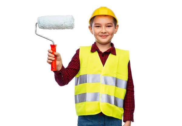 Niño pequeño en casco protector con rodillo de pintura — Foto de Stock