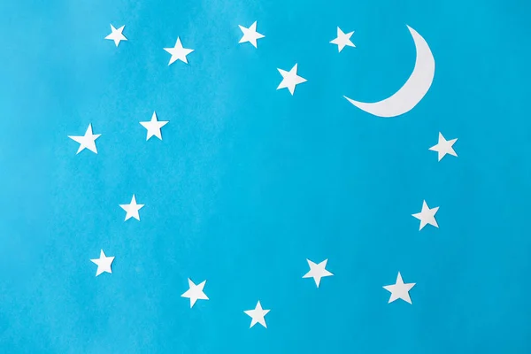 Luna y estrellas sobre fondo azul noche — Foto de Stock