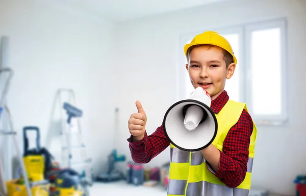 Boy in helmet with megaphone showing thumbs up — Stock Photo, Image