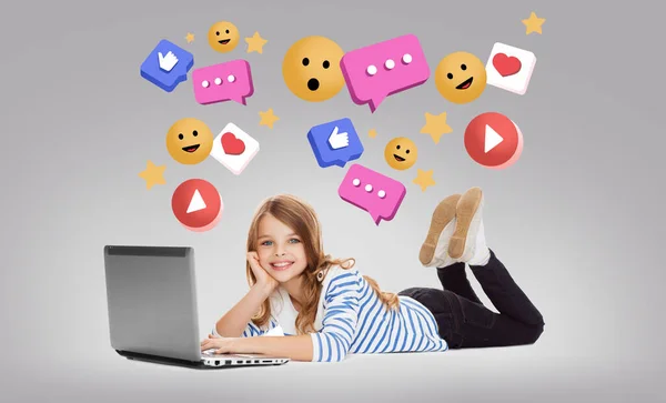 Smiling girl with laptop and internet icons — Stock Photo, Image