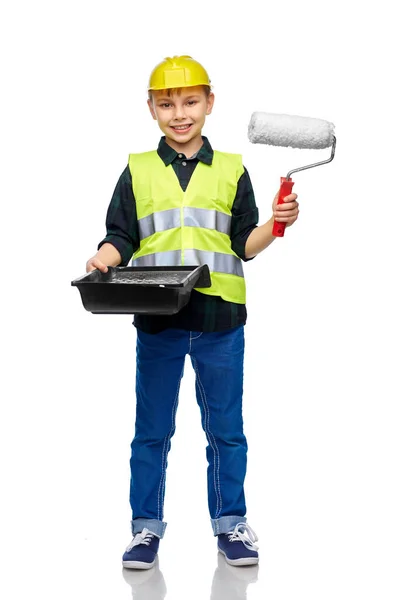 Niño pequeño en casco protector con rodillo de pintura — Foto de Stock