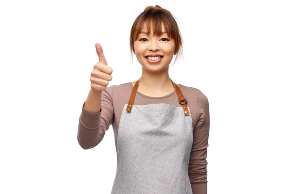 快乐的女厨师或女服务员竖起大拇指 — 图库照片