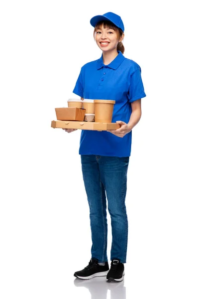 Delivery woman with takeaway food and drinks — Stock Photo, Image
