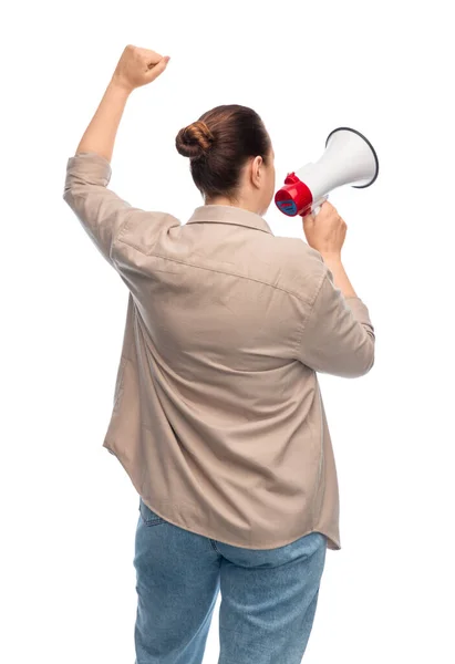Woman with megaphone protesting on demonstration — Stockfoto