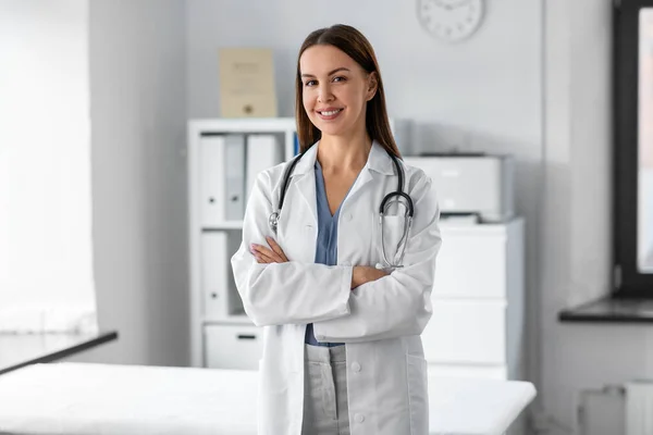 Smiling female doctor with stethoscope at hospital — Stockfoto