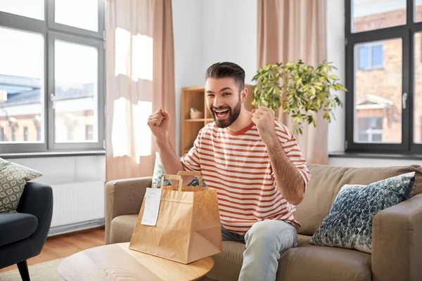 Consumption Eating People Concept Smiling Man Unpacking Takeaway Food Paper — Stockfoto
