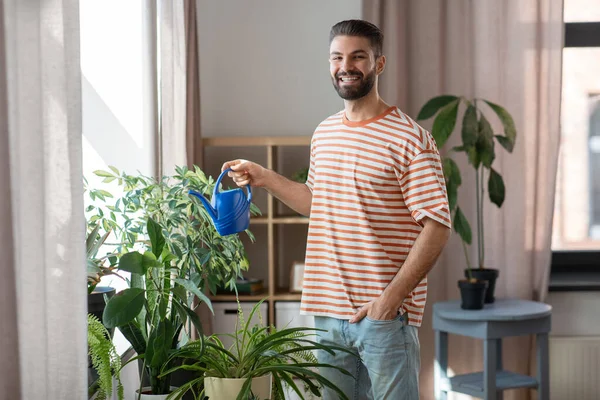 People Nature Plants Care Concept Happy Smiling Man Watering Flowers — Fotografia de Stock