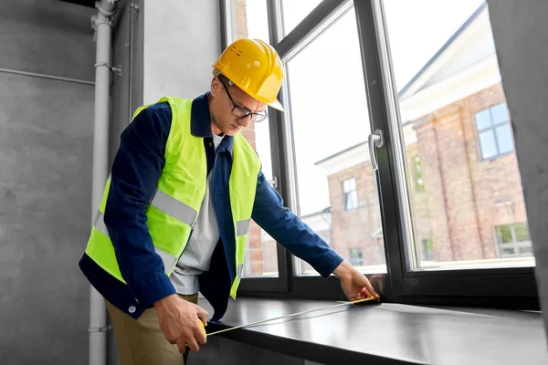 Construction Business Building Concept Male Builder Ruler Measuring Window Sill — Zdjęcie stockowe