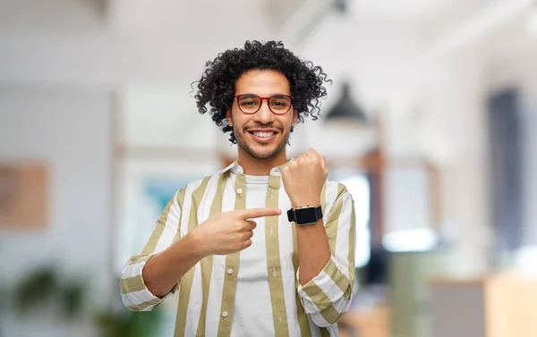 Technology People Concept Smiling Young Man Glasses Showing Smart Watch — Φωτογραφία Αρχείου