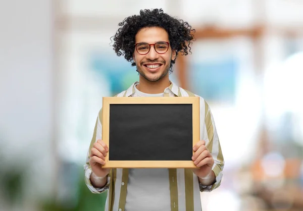 People Concept Smiling Young Man Glasses Holding Chalkboard Office Background — Photo