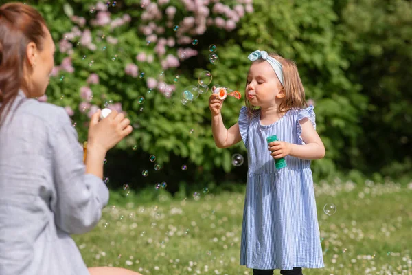 Childhood Leisure People Concept Little Girl Mother Blowing Soap Bubbles — 스톡 사진