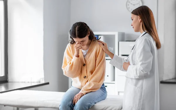 Medicine Healthcare People Concept Female Doctor Comforting Sad Woman Patient — стоковое фото